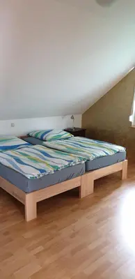 Ein Bett oder Betten in einem Zimmer der Unterkunft Hemich-Esch