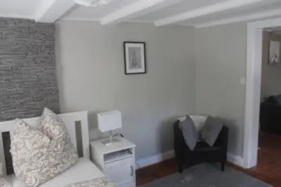 Ein Sitzbereich in der Unterkunft Ferienhaus Hof