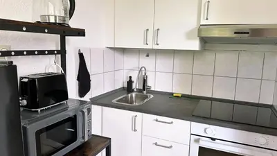 Küche/Küchenzeile in der Unterkunft Schönes Studioapartment Uni Nähe, WLAN, 4 Gäste