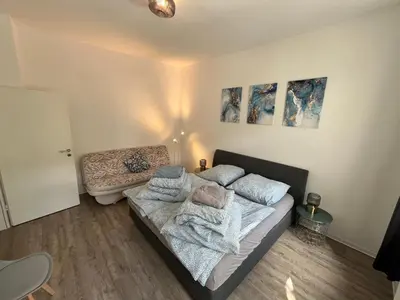 Ein Bett oder Betten in einem Zimmer der Unterkunft Small Sally