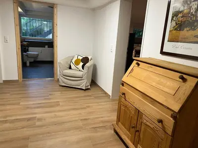 Ein Sitzbereich in der Unterkunft Charmante Souterrain Wohnung