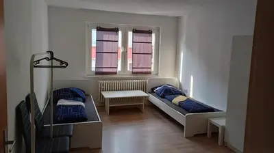 Ein Bett oder Betten in einem Zimmer der Unterkunft K&K Unterkunft Gbr Am Kamannshof