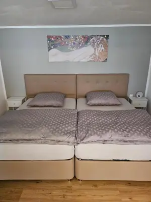 Ein Bett oder Betten in einem Zimmer der Unterkunft Messelodge Deiker Höfe