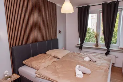 Ein Bett oder Betten in einem Zimmer der Unterkunft sunny & cozy - Netflix - WIFI - City - 4 Person