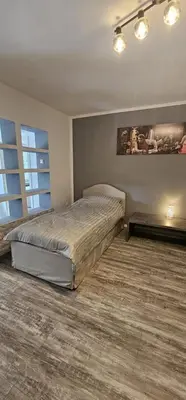 Ein Bett oder Betten in einem Zimmer der Unterkunft M&L Wohnen 3