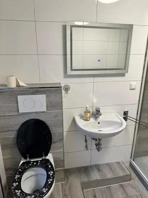 Ein Badezimmer in der Unterkunft M&L Wohnen 3