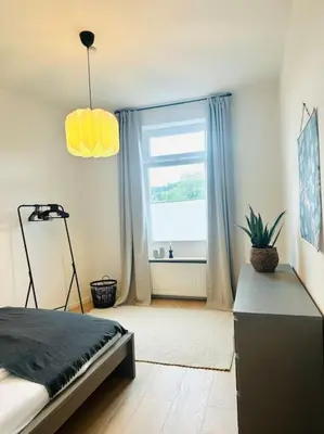 Ein Bett oder Betten in einem Zimmer der Unterkunft WohnTRAUM 140qm - 10 Personen - City - Nähe DUS & Dortmund & Köln & Essen