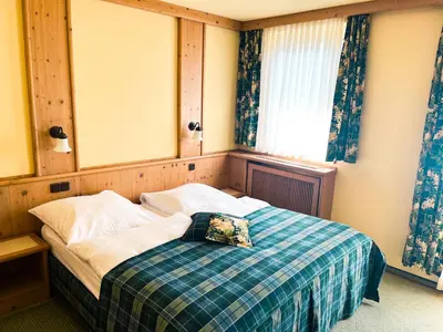 Ein Bett oder Betten in einem Zimmer der Unterkunft Hotel Albers