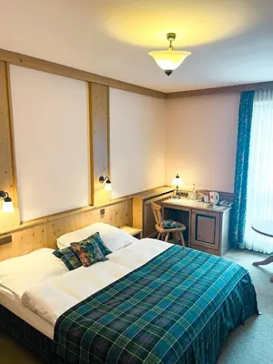 Ein Bett oder Betten in einem Zimmer der Unterkunft Hotel Albers