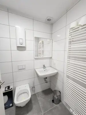 Ein Badezimmer in der Unterkunft City Apart
