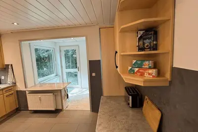 Küche/Küchenzeile in der Unterkunft Geräumiges Apartment mit XXL Leinwand I Parkplatz I WiFi