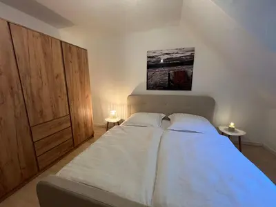 Ein Bett oder Betten in einem Zimmer der Unterkunft 50qm Dachgeschoss Wohnung zentral in Bochum Ehrenfeld - Friederika I