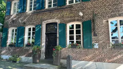 Eine Fassade oder ein Eingang zu Apartment Savanna im historischen Stadtkern Linn in Krefeld, nähe Düsseldorf Messe, Airport, Parkmöglichkeiten direkt vor dem Haus