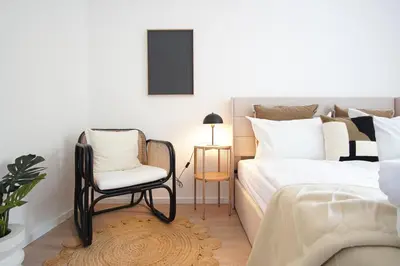 Ein Bett oder Betten in einem Zimmer der Unterkunft HOMEFY - Balcony Apartment