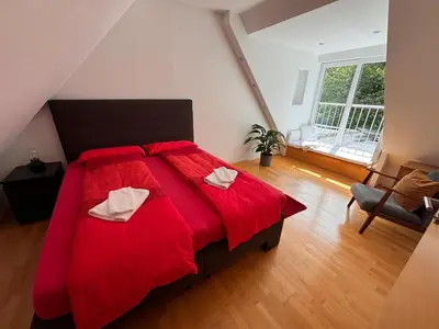 Ein Bett oder Betten in einem Zimmer der Unterkunft MESSE, Uniklinikum, Grugapark - Charmante Wohnung mit Dachterrasse in guter Lage