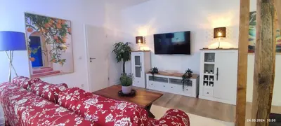TV/Unterhaltungsangebot in der Unterkunft DIE HOTELALTERNATIVE DELUXE APP erste Etage mit 2 Schlafzimmer Haus 63