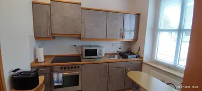 Küche/Küchenzeile in der Unterkunft DIE HOTELALTERNATIVE DELUXE APP erste Etage mit 2 Schlafzimmer Haus 63