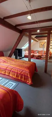 Ein Bett oder Betten in einem Zimmer der Unterkunft DIE HOTELALTERNATIVE DELUXE APP erste Etage mit 2 Schlafzimmer Haus 63