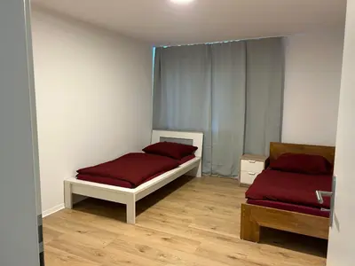 Ein Bett oder Betten in einem Zimmer der Unterkunft Monteur-Lounge