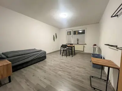 Ein Bett oder Betten in einem Zimmer der Unterkunft Livemore24 - Apartment 5 in Duisburg WLAN - Smart-TV - 24-7 Check-in und Küche