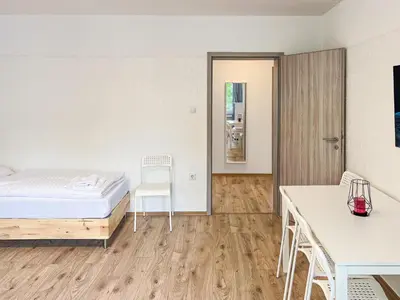 Ein Bett oder Betten in einem Zimmer der Unterkunft T&K Apartments near Messe Fair Trade Düsseldorf und Airport 1A