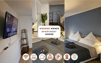 Ein Bett oder Betten in einem Zimmer der Unterkunft Modern Homes - Voll ausgestatte Wohnung - Balkon - Hotelbetten - 4K TV - WLAN