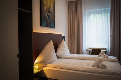 Ein Bett oder Betten in einem Zimmer der Unterkunft Gemütliche Wohnung by Junik Apartments