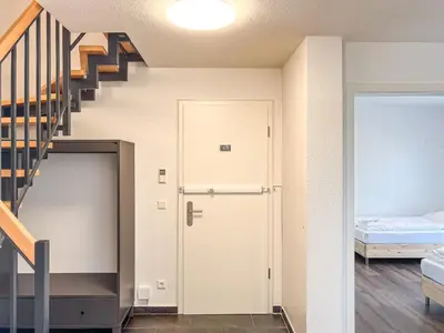 Ein Bett oder Betten in einem Zimmer der Unterkunft T&K Apartments - Mettmann - Schöne 5 Zimmer Maisonette - 20min Messe Fair DUS