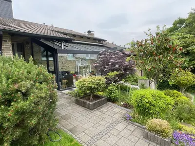 Ein Garten an der Unterkunft Zentrale aber ruhige Lage - Wohnung für bis zu 3 Personen