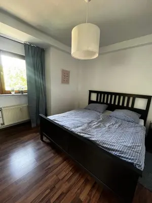Ein Bett oder Betten in einem Zimmer der Unterkunft Idyllisch wohnen an der Ruhr