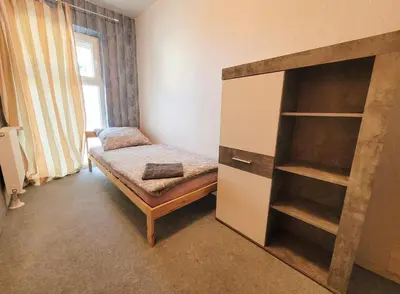 Ein Bett oder Betten in einem Zimmer der Unterkunft Unterkunft in Castrop-Rauxel, Henrichenburg mit guter Verkehrsanbindung
