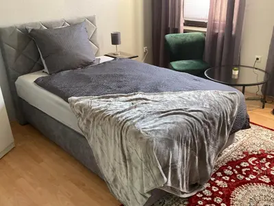 Ein Bett oder Betten in einem Zimmer der Unterkunft Time-Out Westerbauer TA13