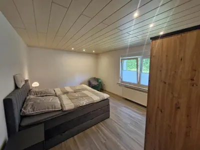 Ein Bett oder Betten in einem Zimmer der Unterkunft Ferienhaus Schwerte Ergste im Ruhrtal