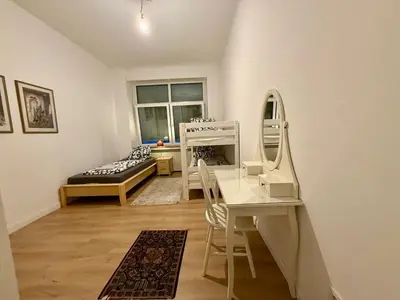 Ein Bett oder Betten in einem Zimmer der Unterkunft Wupa Flats