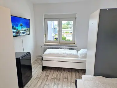 Ein Bett oder Betten in einem Zimmer der Unterkunft Meribu W18-20 Wohnung für Monteure und Arbeiter