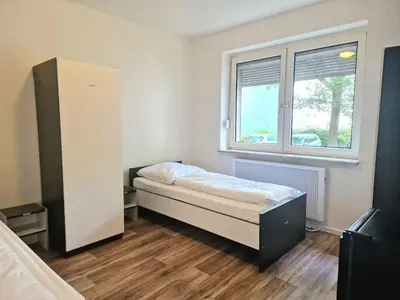 Ein Bett oder Betten in einem Zimmer der Unterkunft Meribu S27 Wohnung für Monteure und Arbeiter
