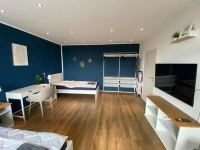 TV/Unterhaltungsangebot in der Unterkunft Blaue Lagune 2,5 Zimmer Balkon smartTV Küche WiFi