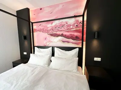 Ein Bett oder Betten in einem Zimmer der Unterkunft City Apartment with WIFI, Kitchen and 4K TV