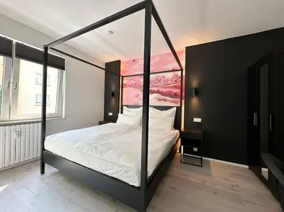 Ein Bett oder Betten in einem Zimmer der Unterkunft City Apartment with WIFI, Kitchen and 4K TV