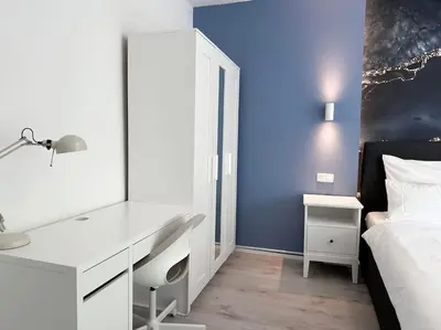 Ein Bett oder Betten in einem Zimmer der Unterkunft City Apartment with WIFI, Kitchen and 4K TV