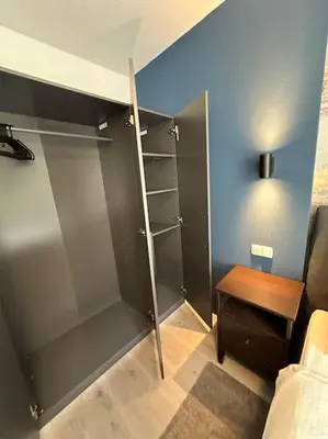 Ein Bett oder Betten in einem Zimmer der Unterkunft City Apartment with WIFI, Kitchen and 4K TV