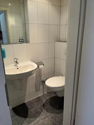 Ein Badezimmer in der Unterkunft Hotel Herzog