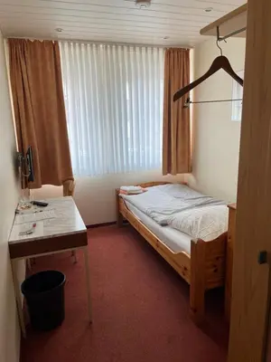 Ein Bett oder Betten in einem Zimmer der Unterkunft Hotel Herzog