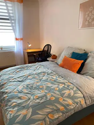 Ein Bett oder Betten in einem Zimmer der Unterkunft Sternbusch Wohnung, perfekte Lage zwischen Uni und Hbf Duisburg