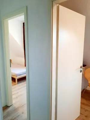 Ein Bett oder Betten in einem Zimmer der Unterkunft Ferienwohnung Gutmensch