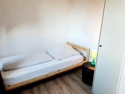 Ein Bett oder Betten in einem Zimmer der Unterkunft Ferienwohnung Gutmensch