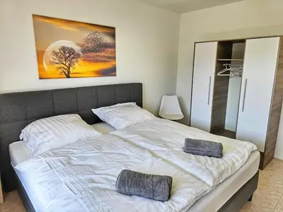 Ein Bett oder Betten in einem Zimmer der Unterkunft 3 Zimmer Apartment mit Balkon