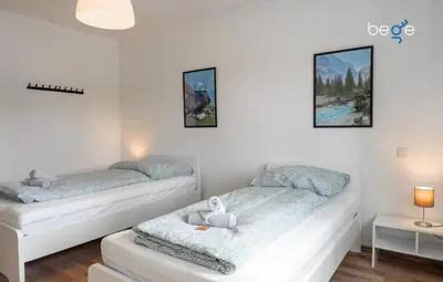 Ein Bett oder Betten in einem Zimmer der Unterkunft BEGE APARTMENTS Corporate Lodge
