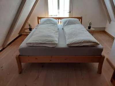 Ein Bett oder Betten in einem Zimmer der Unterkunft Gemütliches Fachwerkhaus