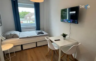 Ein Bett oder Betten in einem Zimmer der Unterkunft BEGE APARTMENTS Corporate Hub